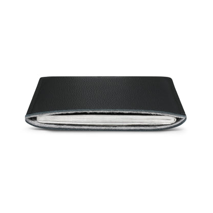 Black leather passport sleeve with British passport, opening end view – The Bridge