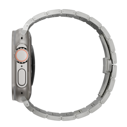 A silver Apple watch shown from the side profile, featuring a matching metallic link band and a circular orange accent ring around the digital crown.