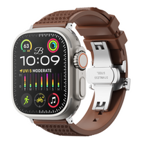 Smartwatch with a brown strap and metal back on a white background
