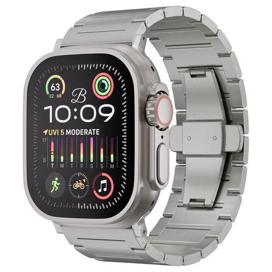 A silver stainless steel smartwatch with a matching metal link band, shown at a three-quarter angle on a solid white background. The watch face is active with various digital watch faces and fitness indicators visible.